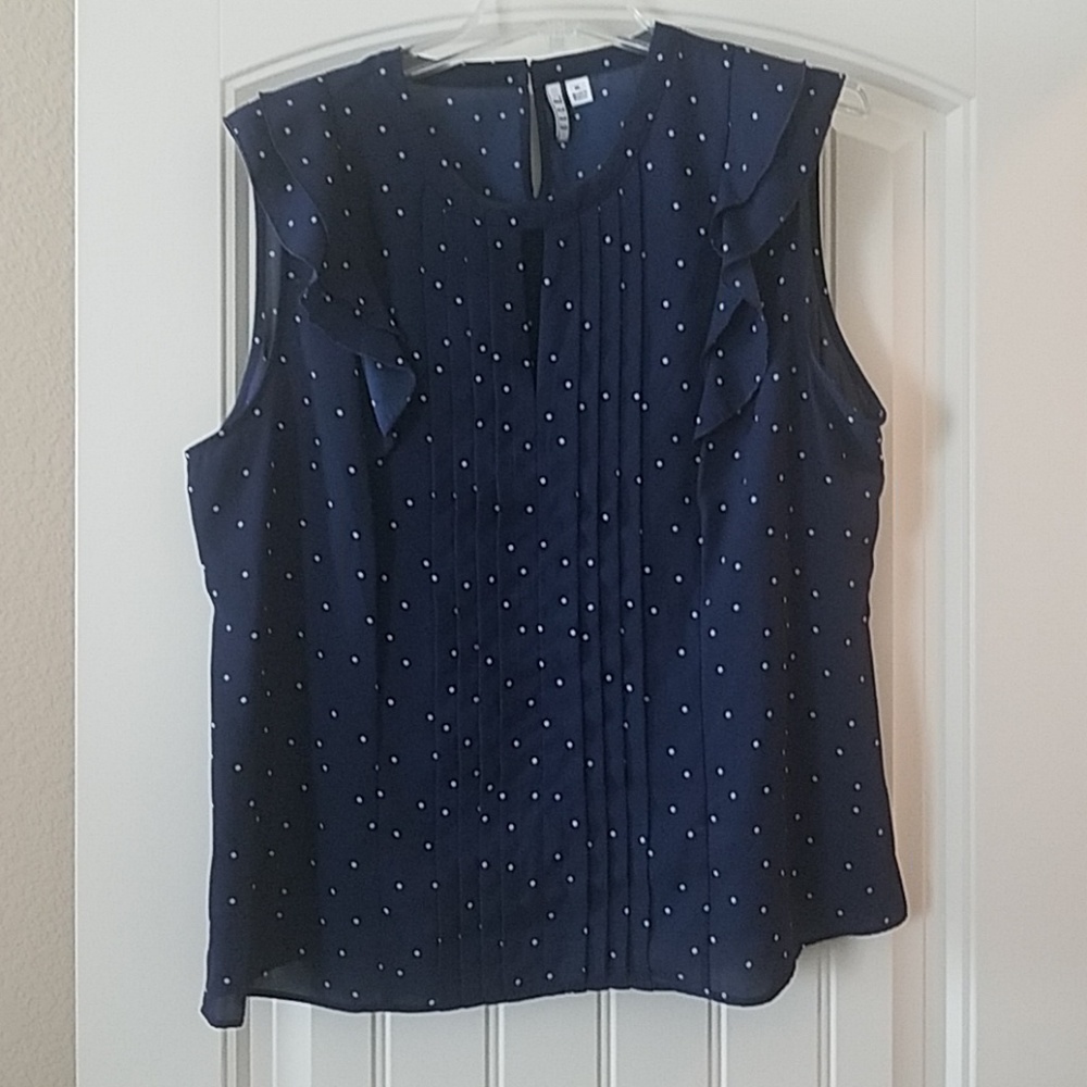 Navy blue and white polka dot blouse